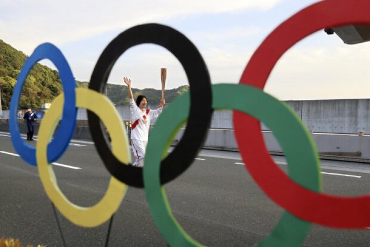 تصویر آغاز مراسم حمل مشعل المپیک در پارکِ «بدون تماشاگر»