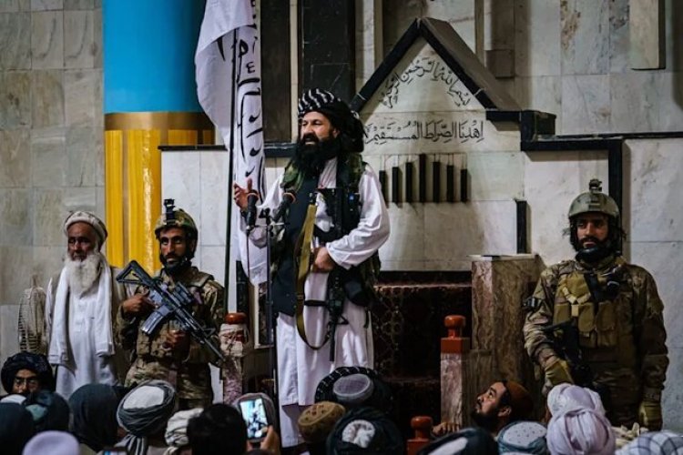 تصویر ریشخند طالبان به آمریکا!