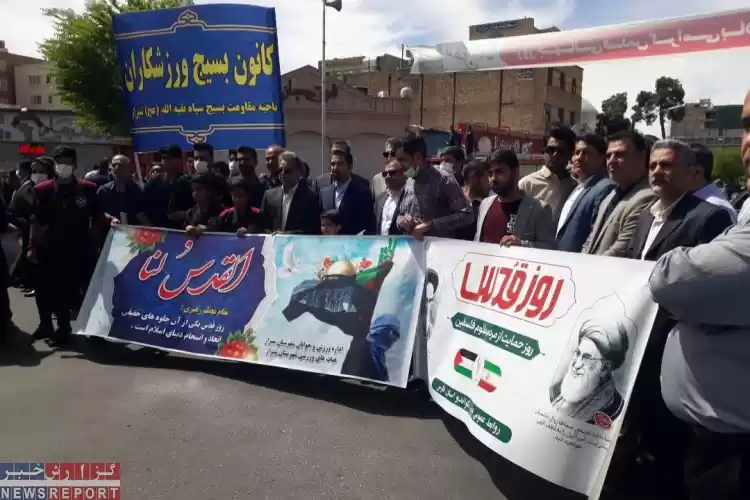 تصویر حضور اعضای هیات ورزش های همگانی استان فارس همراه با جامعه وزش در راهپیمایی روز جهانی قدس